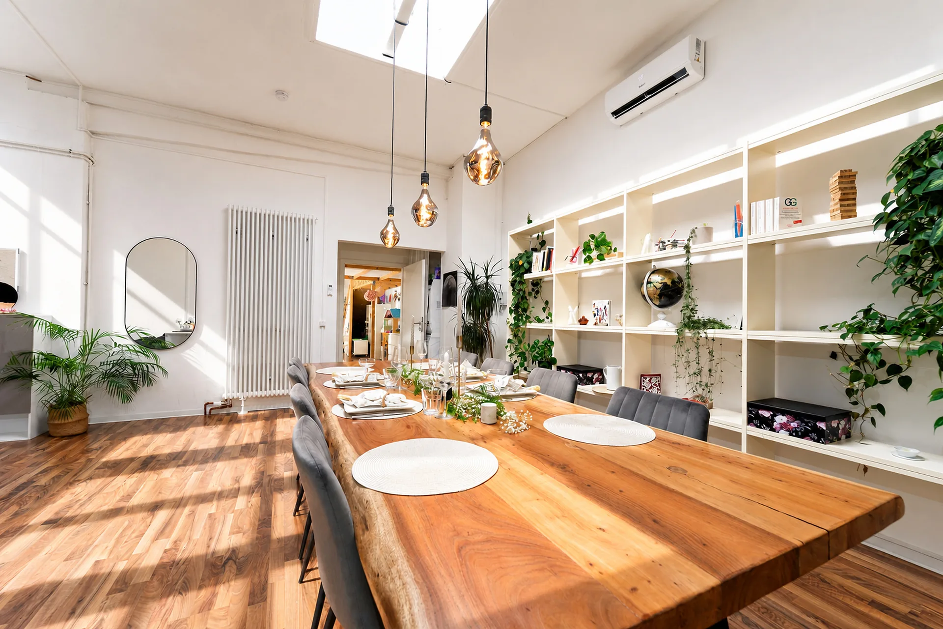 Large dining table for 8 under the skylight