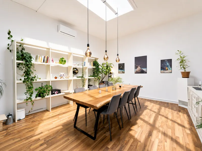 Large dining table for 8 under the skylight