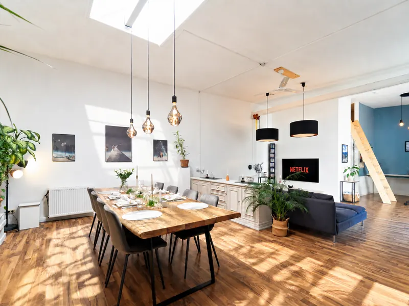 Large dining table for 8 under the skylight