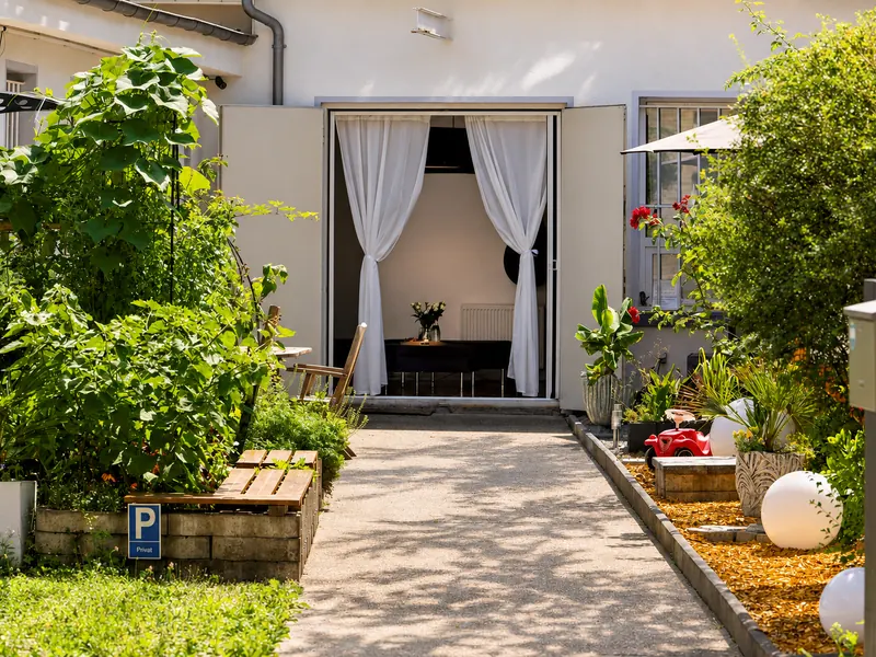 Private courtyard with Weber barbecue and parking