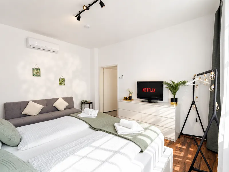 Master bedroom with king-size bed